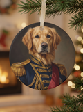 The pet portrait ornament hanging on a fir branch