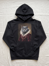 A cat in the Duchess portrait style printed on a black heavyweight hoodie, flat lay